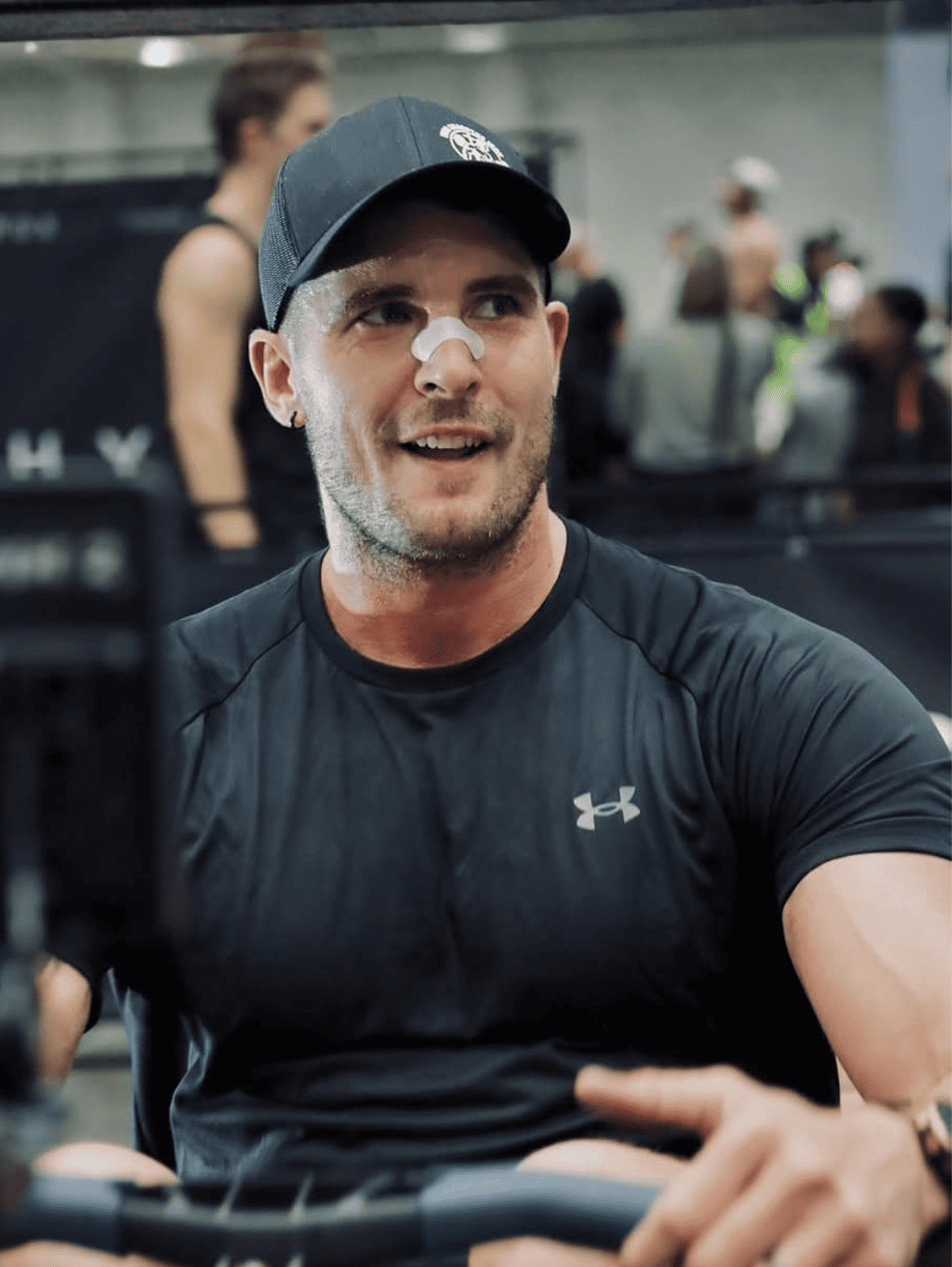 Man wearing AirStrips nasal strip to improve breathing during daily activity – supports better sleep, airflow, and athletic performance